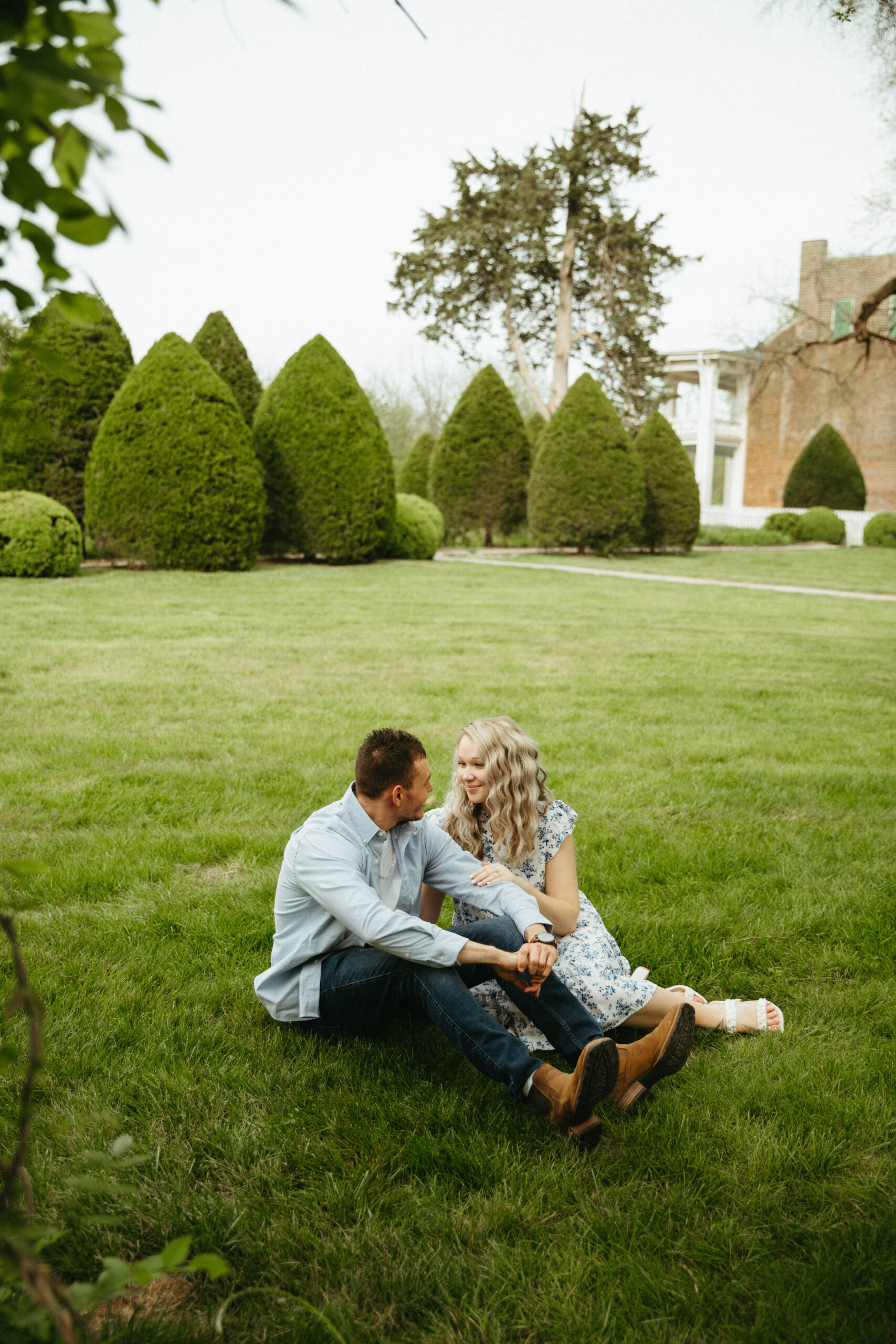 couple taking engagement photos at Carnton House Grounds in Franklin, Tennessee